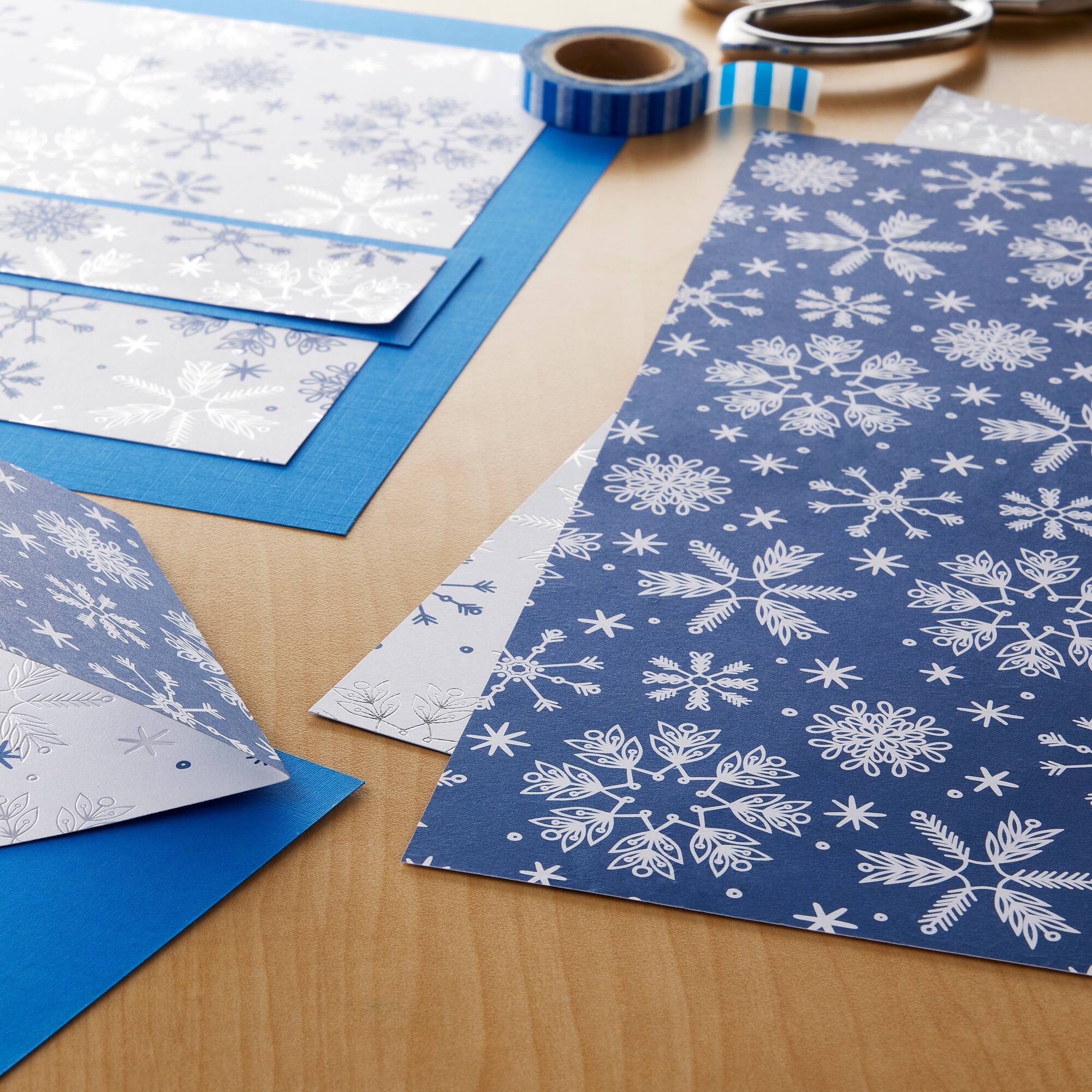 24 Pack: Snowflakes Double-Sided Cardstock Paper by Recollections™, 12" x 12"